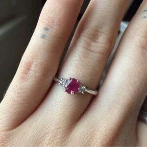 ruby ring with two natural diamonds